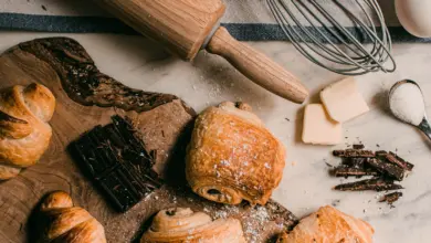 brown wooden rolling pin beside brown wooden rolling pin