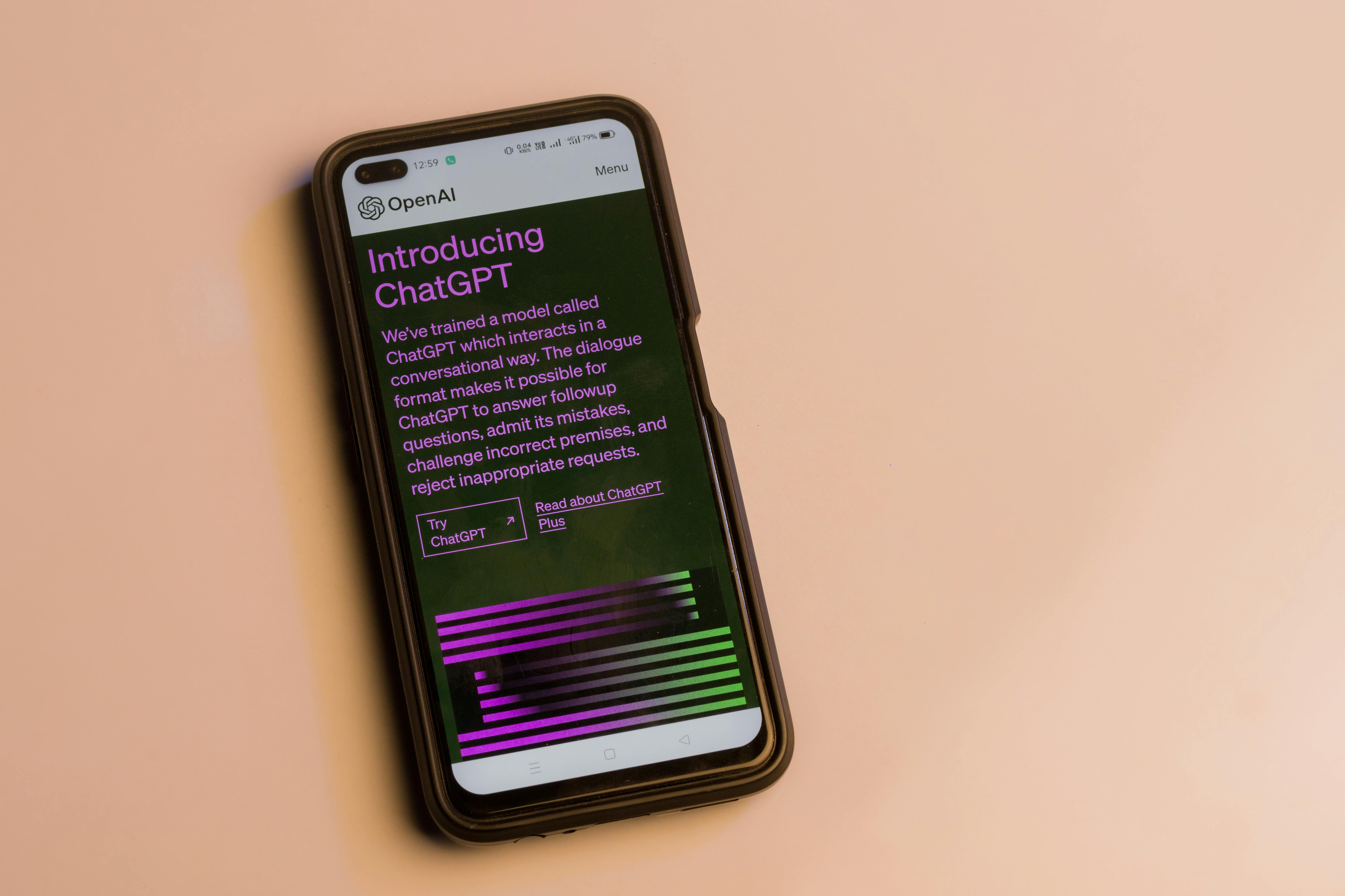 Smartphone screen showing ChatGPT introduction by OpenAI, showcasing AI technology.