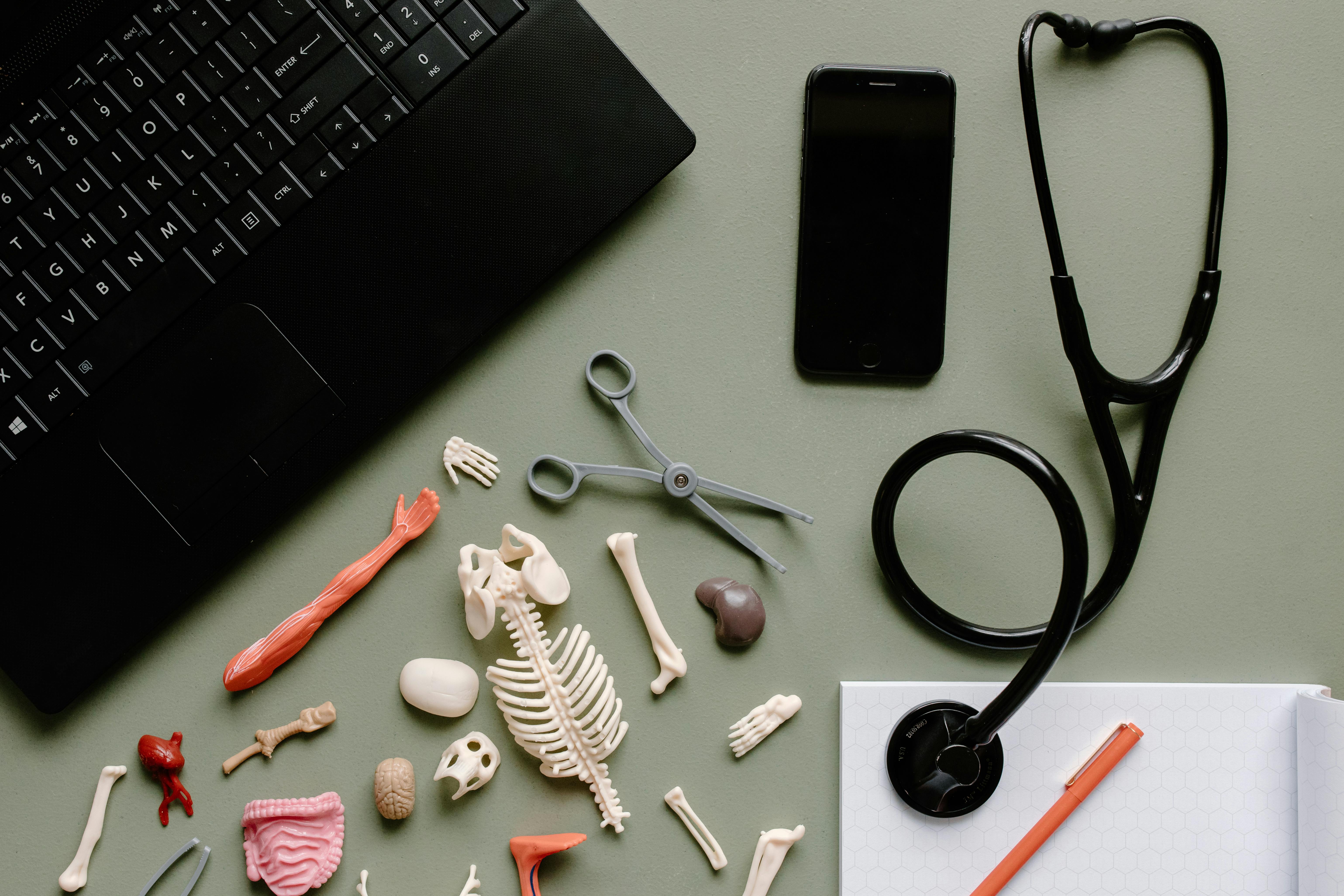 Flat lay of medical tools on a desk, representing digital health advancements.